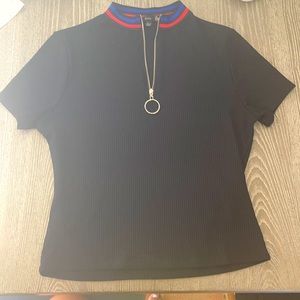 Black t-shirt, with blue and red lines on the top